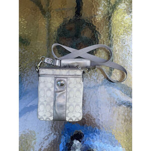 Coach silver Sutton signature swingback crossbody bag
